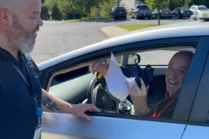 Man receiving NARCAN during our drive thru event