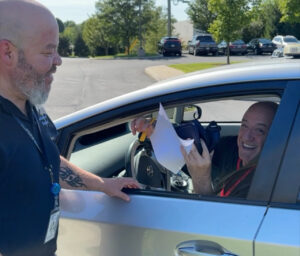 Man receiving NARCAN during our drive thru event